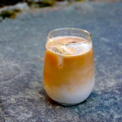 cold brew coffee with milk on pavement