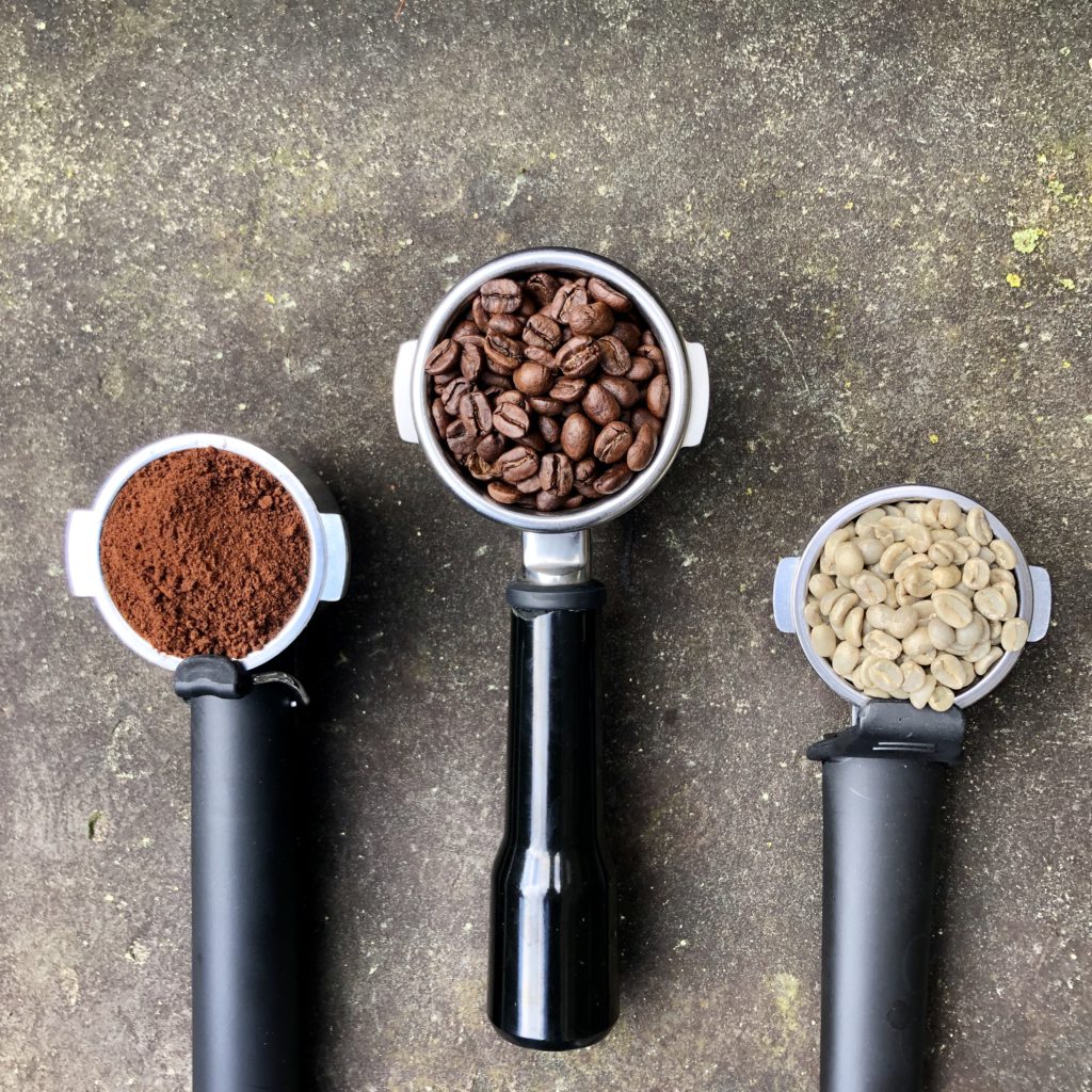 Coffee beans, coffee grounds, green coffee beans in three group heads