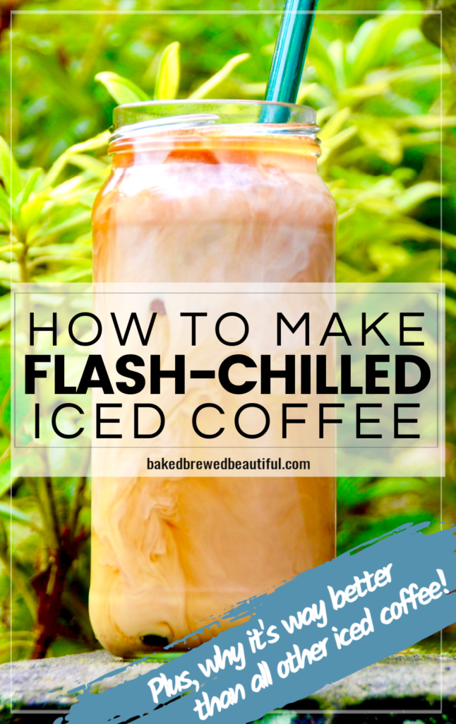 iced coffee outside with swirled milk with a green leaf background