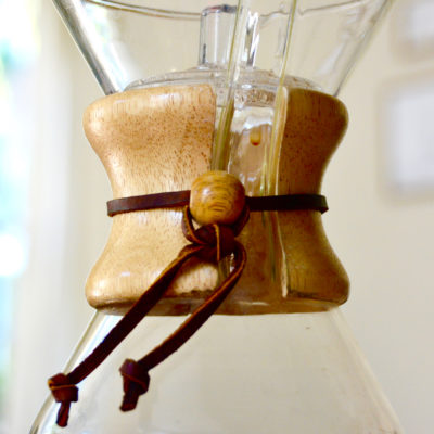 close up Chemex filled with coffee on a table top