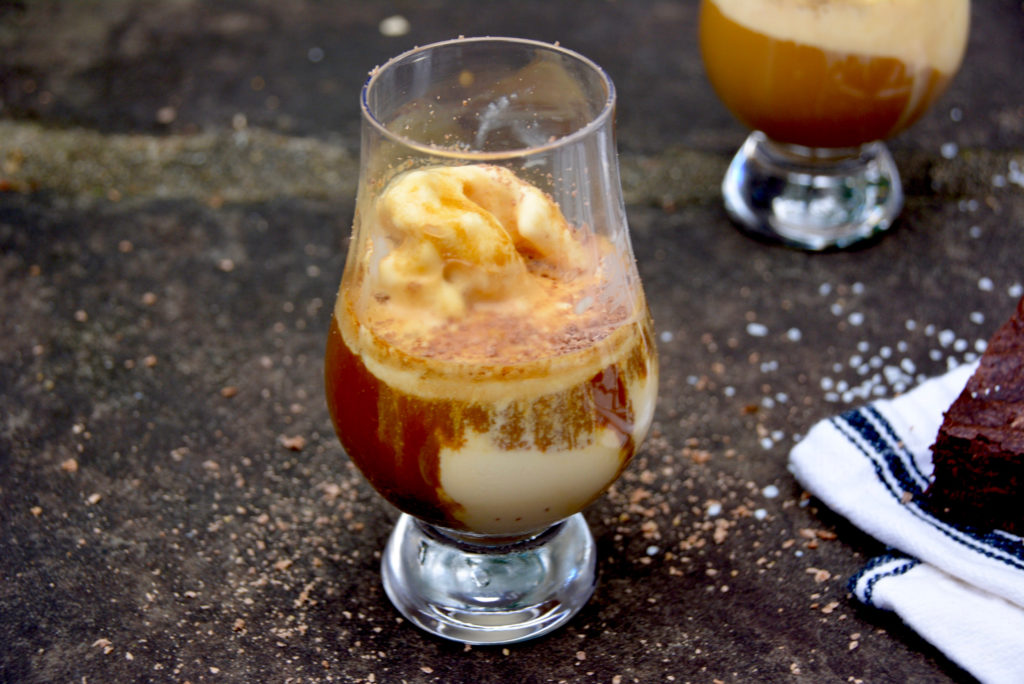 two affogatos on pavement outside with vanilla ice cream and espresso