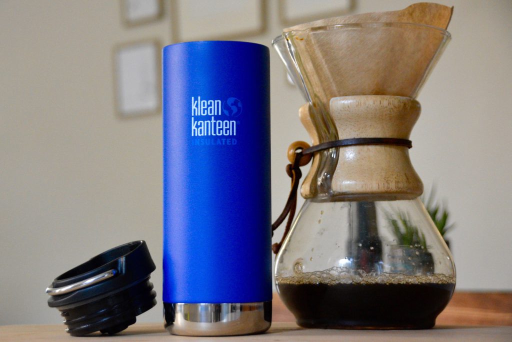 blue klean kanteen thermos next to a chemex with coffee