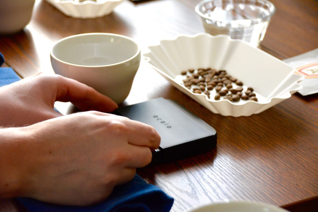 acaia scale in a cupping coffee session