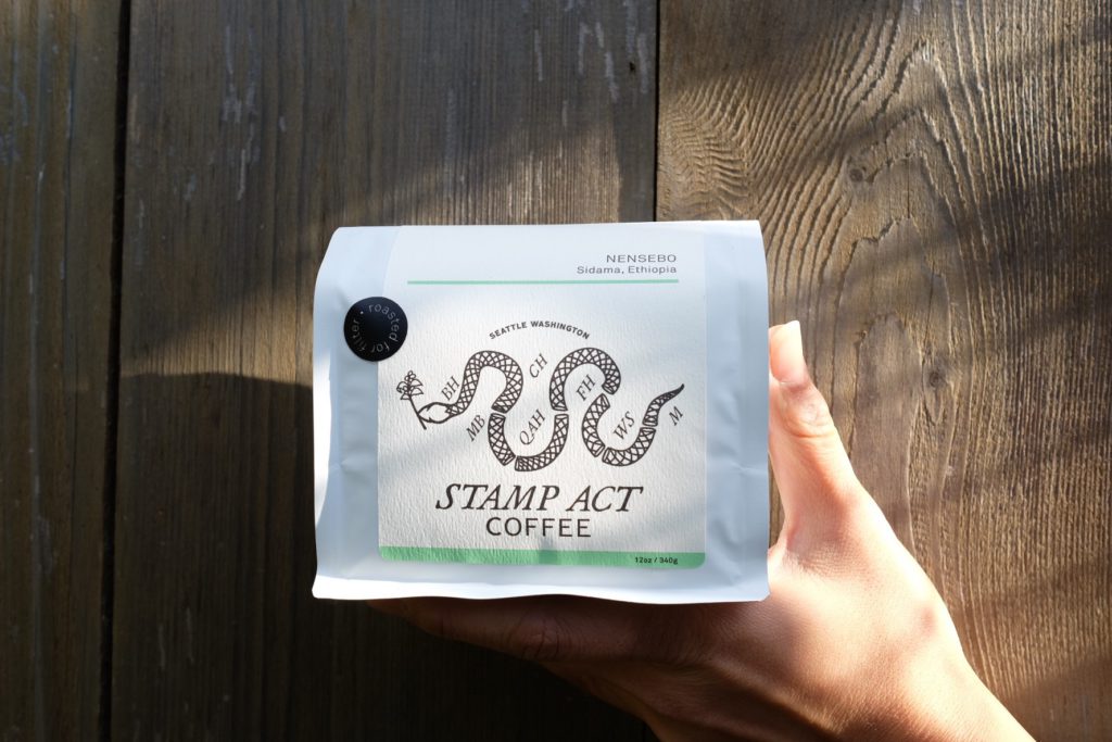 stamp act coffee on a wooden background 