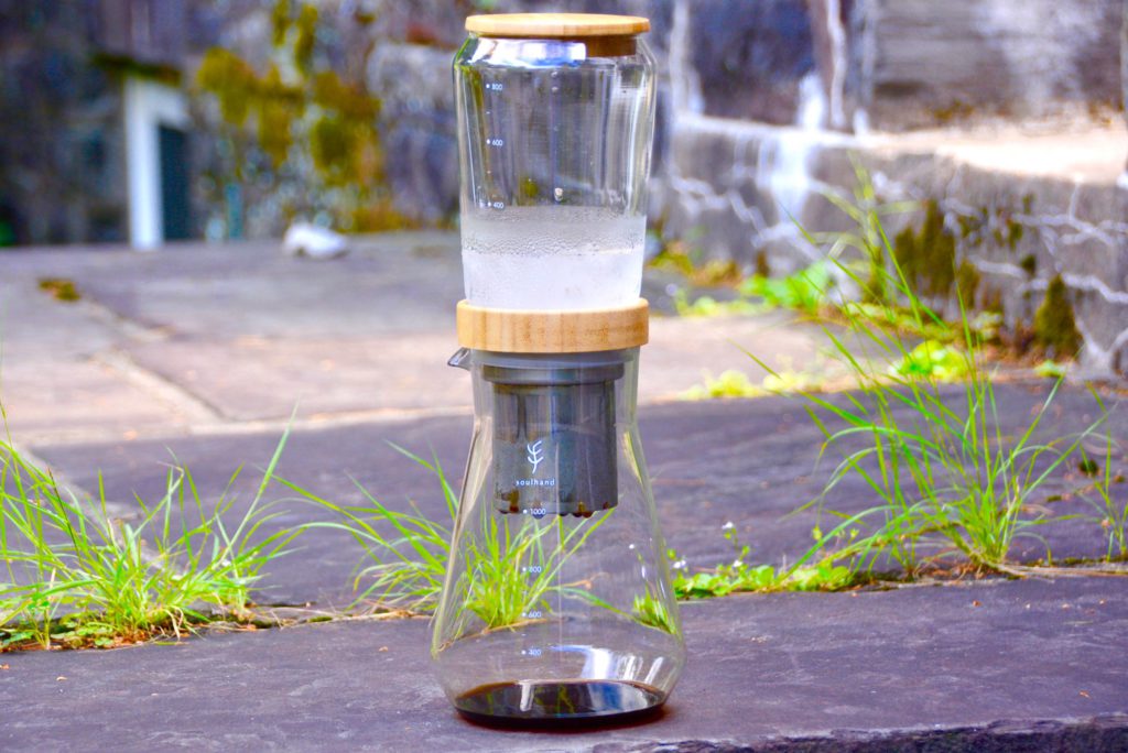 slow drip cold brew coffee tower on pavement