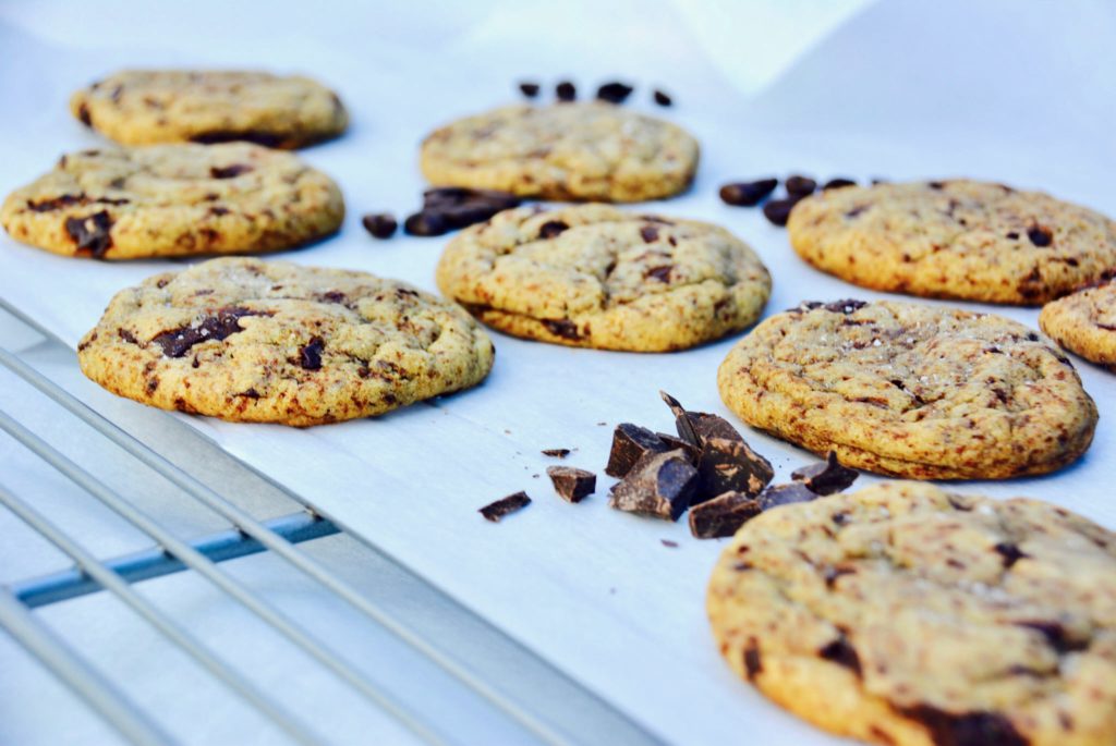 dark chocolate espresso cookies laying down on parchment paper